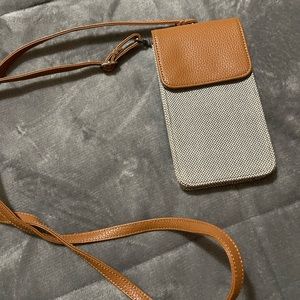 Call me crossbody by thirty-one. Holds phone and a few credit cards